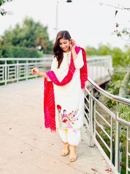 Woman In Traditional Indian Attire Or Embroidered Kurta Set With pink Bandhej Dupatta Set